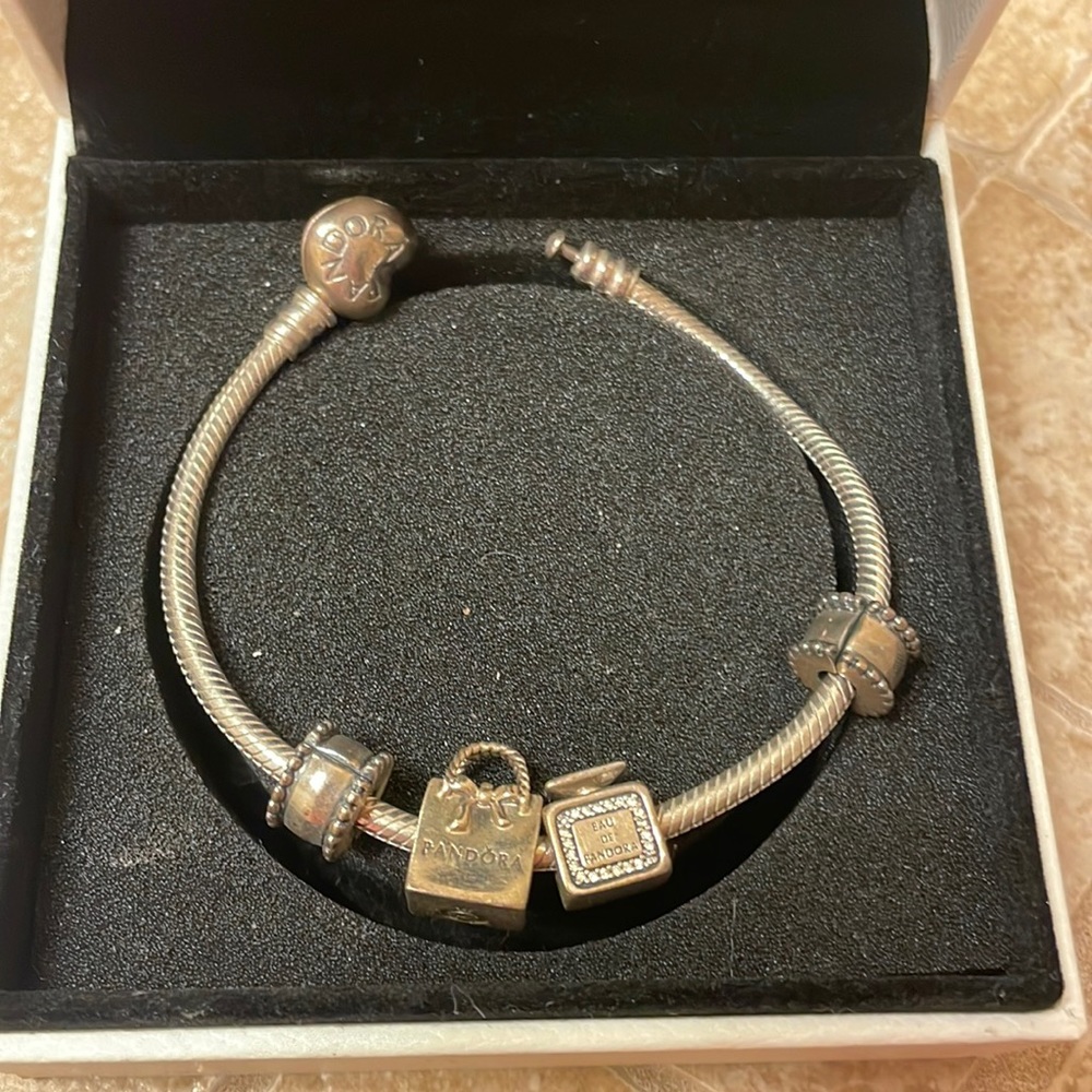 pandora bracelet with 2 charms!